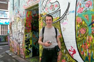 Mark Holsworth with Melbourne graffiti